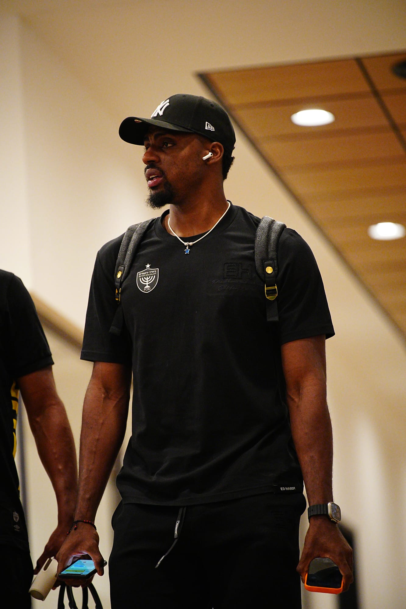 Match day arrival — player entering the venue