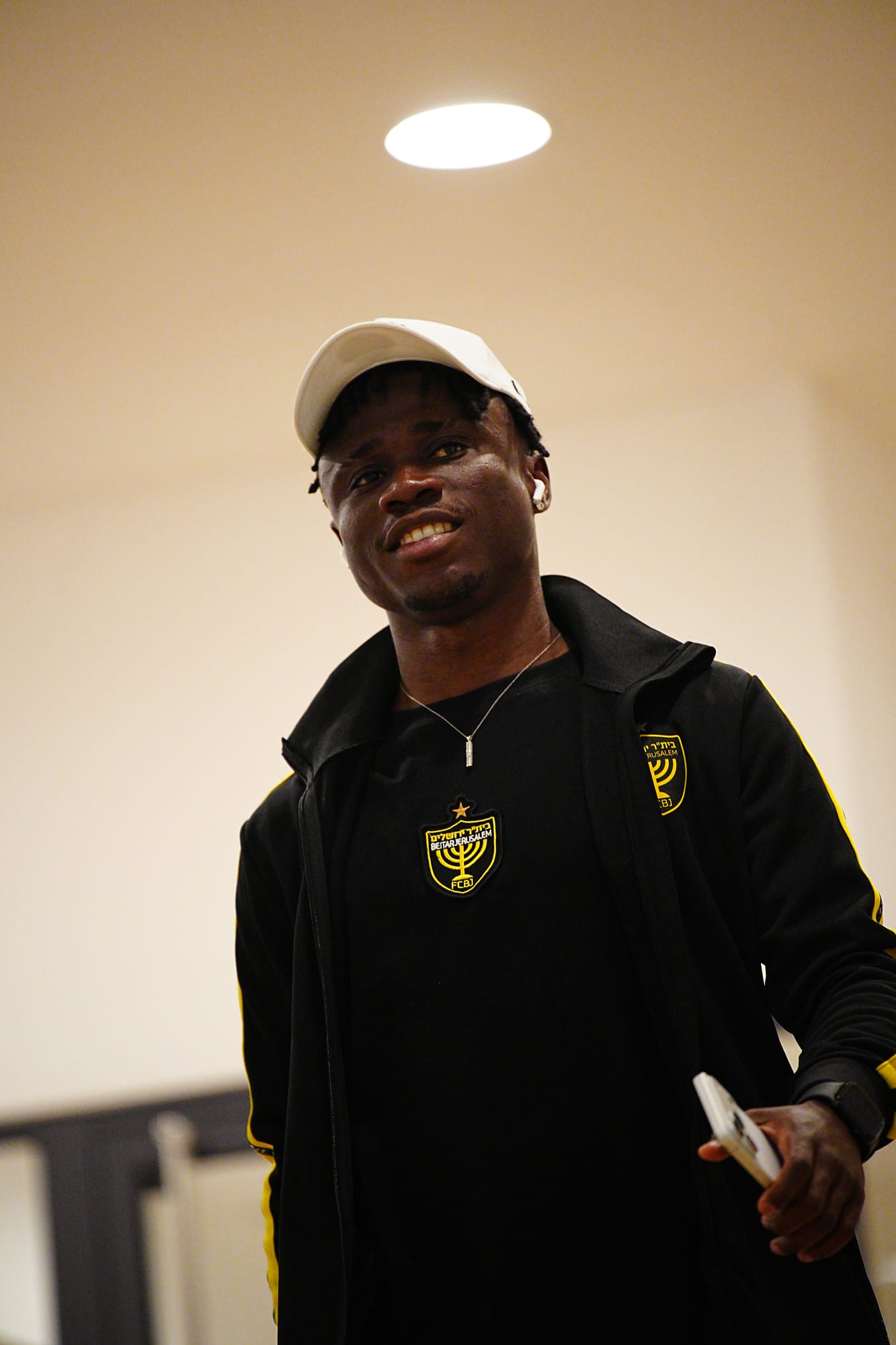 Beitar player arriving before kick-off