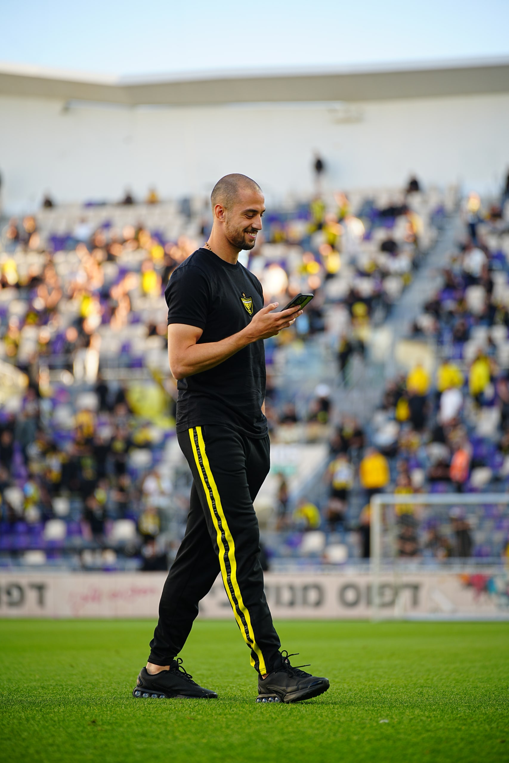 Match day arrival — player entering the venue