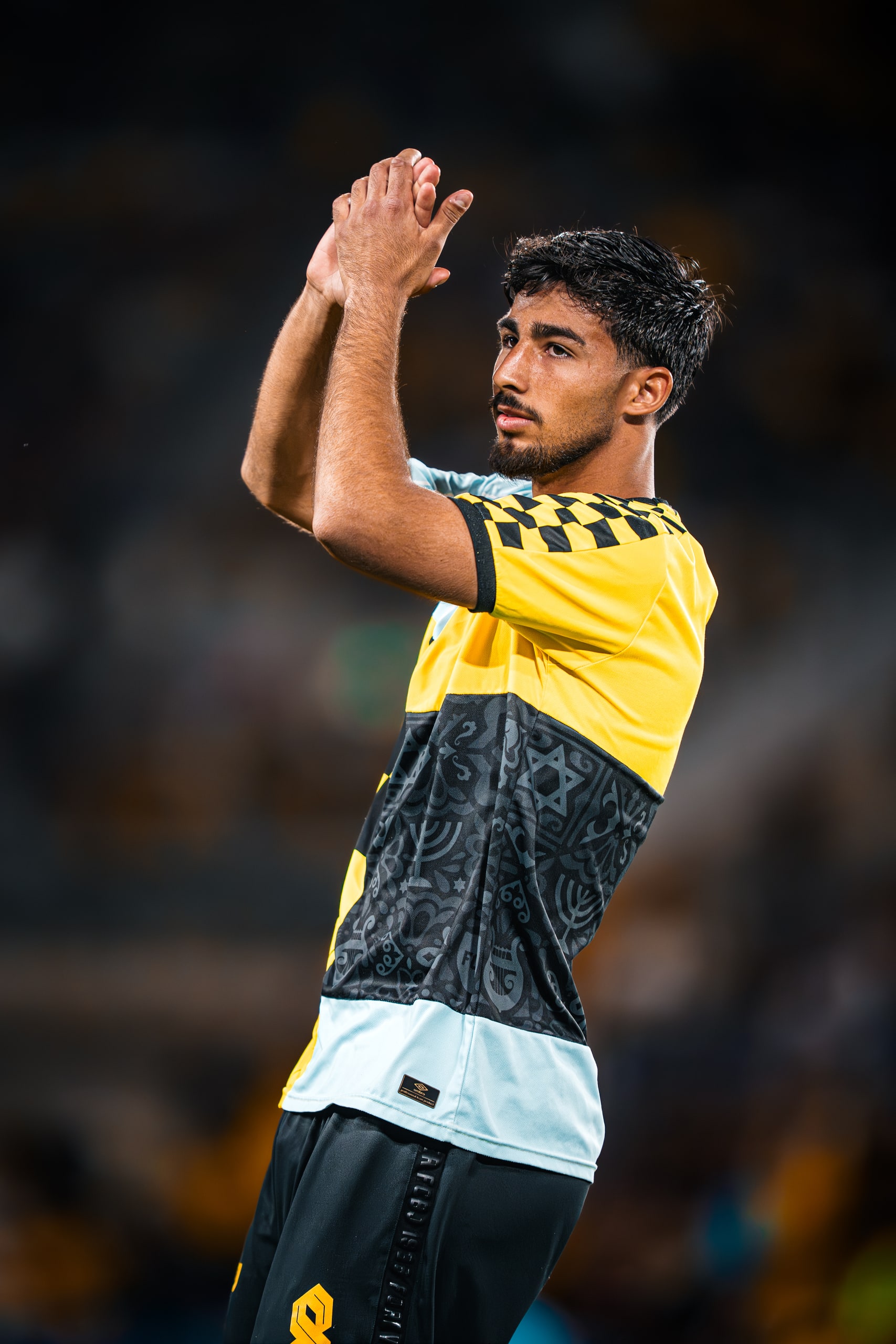 Player warming up on the pitch